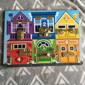Melissa & Doug latches board